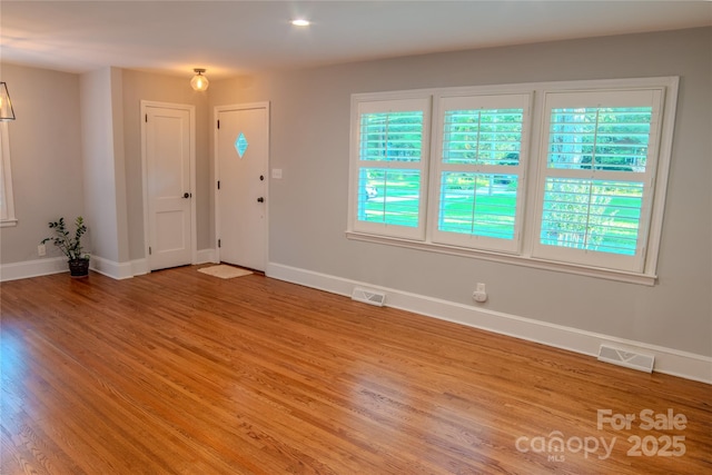 2115 Arnold Dr, Charlotte, NC 28205 - foyer with light wood-type flooring and healthy amount of natural light