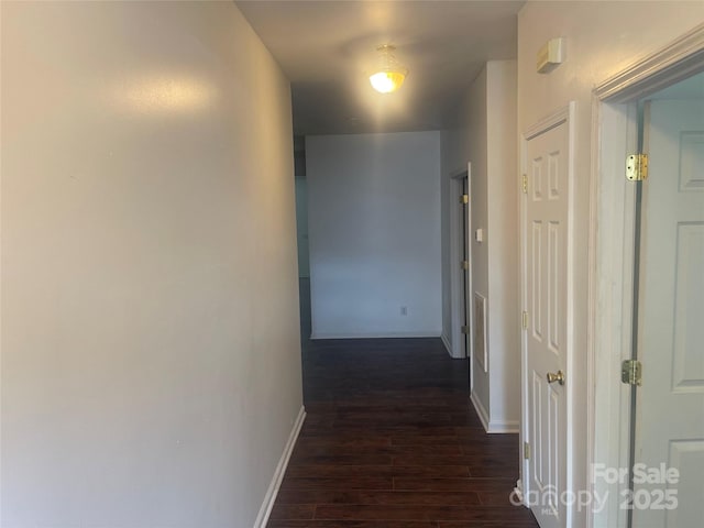 4454 Glenlea Commons Dr, Charlotte, NC 28216 - corridor featuring dark wood-style floors and baseboards