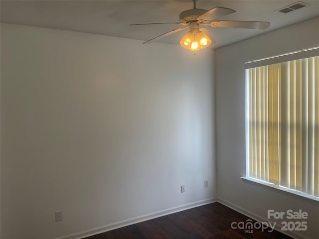 4454 Glenlea Commons Dr, Charlotte, NC 28216 - spare room featuring dark wood-style flooring and ceiling fan