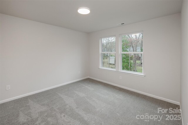 2591 Watson Dr, Lancaster, SC 29720 - carpeted empty room featuring baseboards