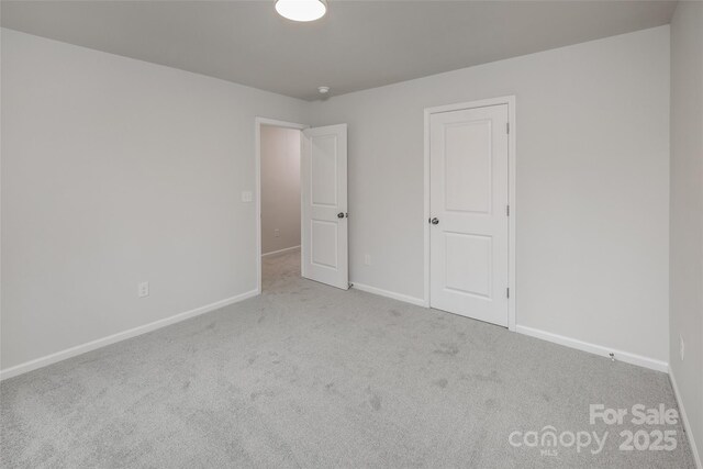 2591 Watson Dr, Lancaster, SC 29720 - unfurnished bedroom with carpet floors and baseboards