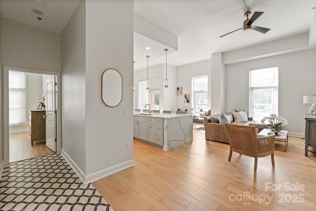 1315 E Blvd Unit 225, Charlotte, NC 28203 - hall featuring a sink and light wood-style floors