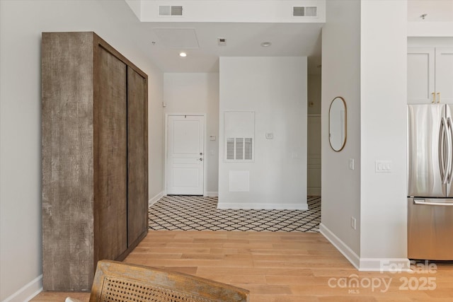 1315 E Blvd Unit 225, Charlotte, NC 28203 - hallway featuring recessed lighting and light wood finished floors