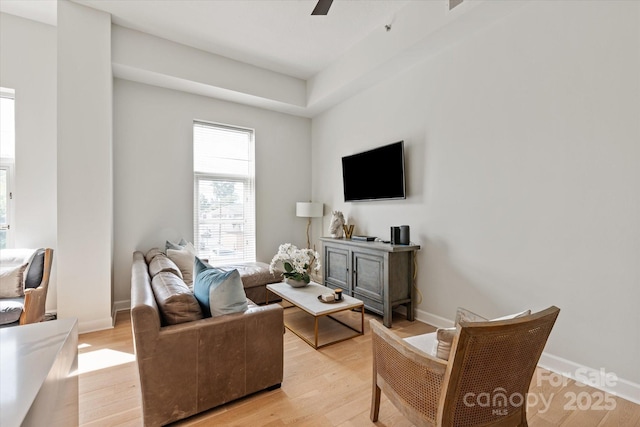 1315 E Blvd Unit 225, Charlotte, NC 28203 - living area featuring light wood-style floors and ceiling fan