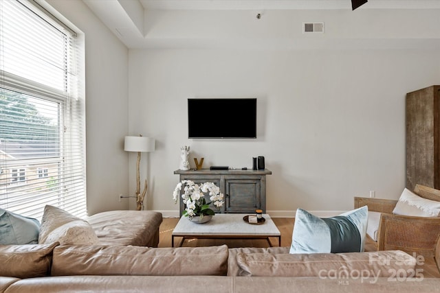 1315 E Blvd Unit 225, Charlotte, NC 28203 - living area with baseboards and wood finished floors