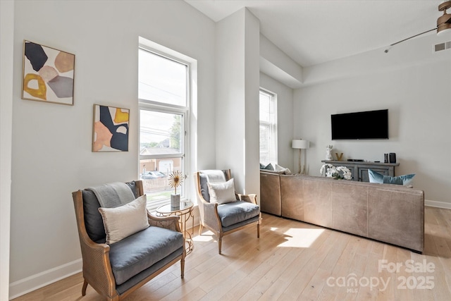 1315 E Blvd Unit 225, Charlotte, NC 28203 - living area featuring light wood-style floors and baseboards