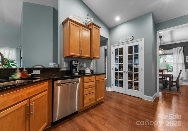 163 Sassafras Rd, Mooresville, NC 28115 - kitchen with stainless steel dishwasher, french doors, vaulted ceiling, dark wood-style floors, and brown cabinets