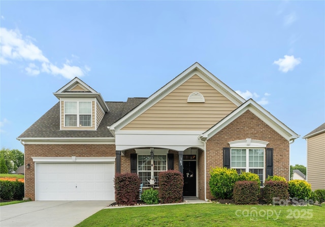 163 Sassafras Rd, Mooresville, NC 28115 - traditional-style home with driveway, brick siding, and a front lawn