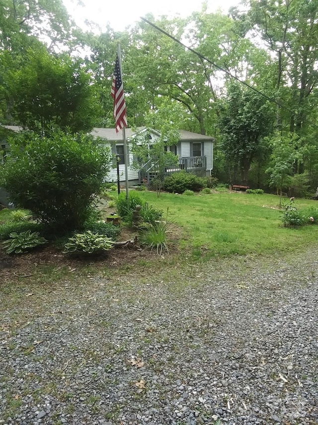 41 Laurel Brook Dr, Fairview, NC 28730 - view of green lawn featuring a wooden deck