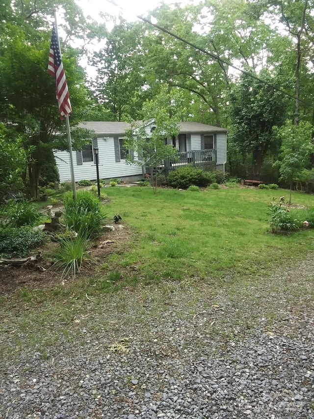 41 Laurel Brook Dr, Fairview, NC 28730 - view of grassy yard featuring a wooden deck