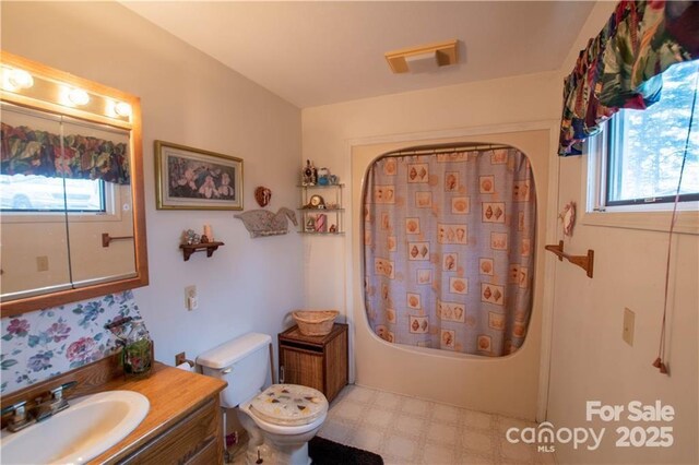 177 Mountain View Ln, Troy, NC 27371 - full bathroom featuring vanity, tile patterned floors, and shower / tub combo with curtain