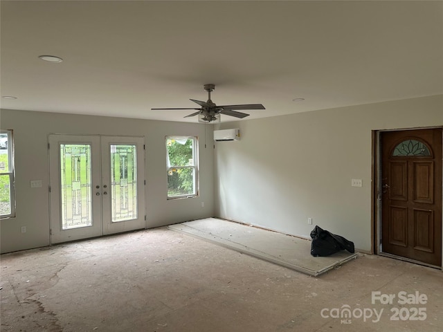 177 Mountain View Ln, Troy, NC 27371 - entrance foyer with a wall mounted AC, french doors, ceiling fan, and recessed lighting