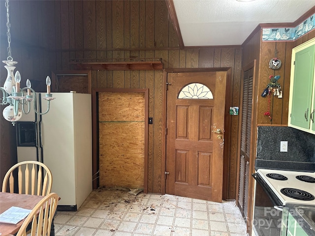 177 Mountain View Ln, Troy, NC 27371 - kitchen with white appliances, light floors, and wood walls