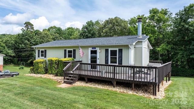 1467 Conway Dr, Granite Falls, NC 28630 - ranch-style house with a wooden deck, a front yard, and a shingled roof