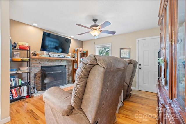 1467 Conway Dr, Granite Falls, NC 28630 - living room with a fireplace with raised hearth, light wood-style floors, ceiling fan, and recessed lighting