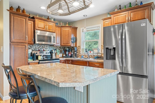 1467 Conway Dr, Granite Falls, NC 28630 - kitchen featuring appliances with stainless steel finishes, light countertops, and backsplash