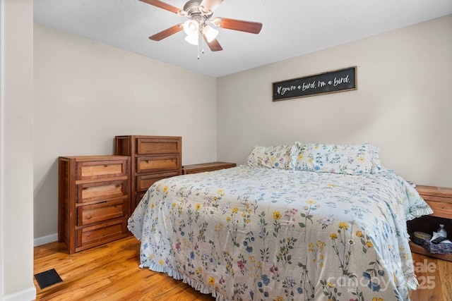 1467 Conway Dr, Granite Falls, NC 28630 - bedroom with light wood-style flooring and a ceiling fan
