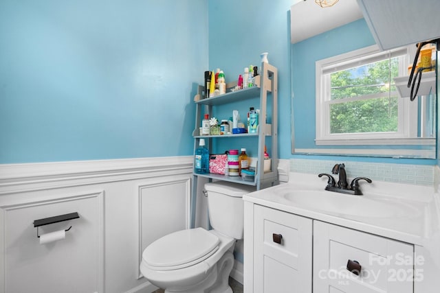 1467 Conway Dr, Granite Falls, NC 28630 - half bath with vanity, wainscoting, and decorative backsplash