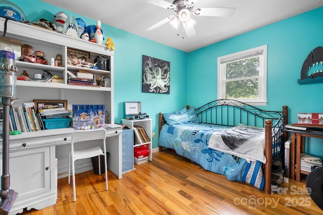 1467 Conway Dr, Granite Falls, NC 28630 - bedroom featuring wood finished floors and a ceiling fan