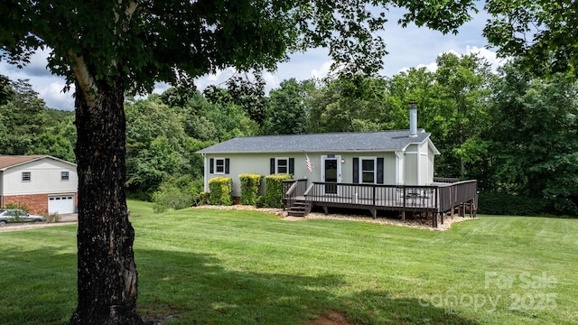 1467 Conway Dr, Granite Falls, NC 28630 - view of front facade featuring a deck, a front yard, and a chimney