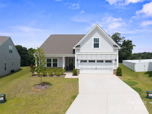 117 Carmine Ct, Troutman, NC 28166 - traditional-style house with concrete driveway and an attached garage
