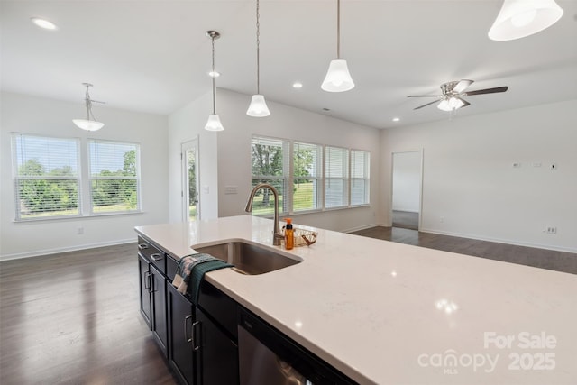 117 Carmine Ct, Troutman, NC 28166 - kitchen featuring dark wood finished floors, open floor plan, ceiling fan, pendant lighting, and recessed lighting