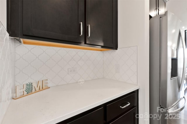 117 Carmine Ct, Troutman, NC 28166 - kitchen featuring stainless steel fridge with ice dispenser and tasteful backsplash