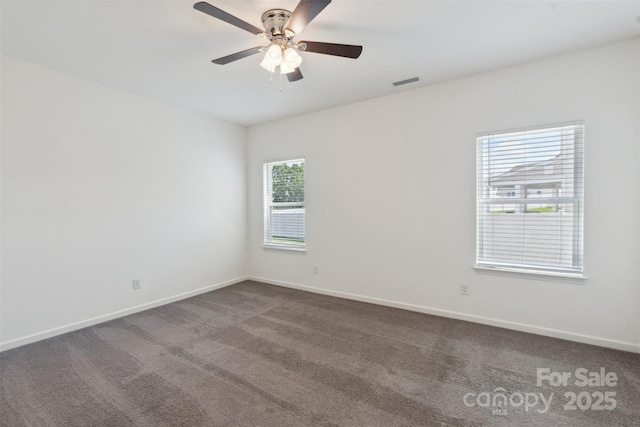 117 Carmine Ct, Troutman, NC 28166 - empty room with dark carpet and ceiling fan