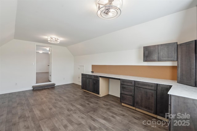 117 Carmine Ct, Troutman, NC 28166 - bonus room featuring lofted ceiling, dark wood finished floors, and a desk
