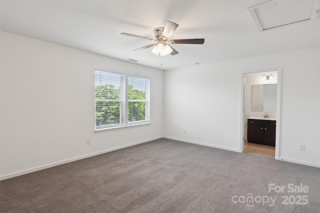 117 Carmine Ct, Troutman, NC 28166 - unfurnished bedroom with light carpet, attic access, ensuite bath, and ceiling fan