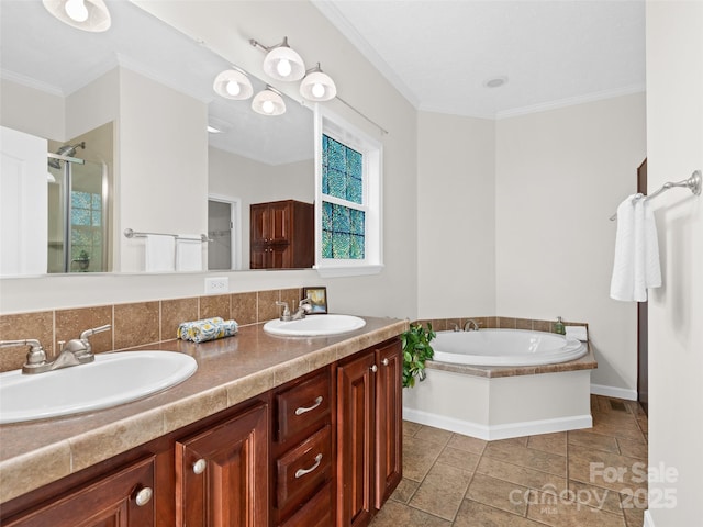 9 Farthings Dr, Arden, NC 28704 - bathroom featuring a bath, crown molding, double vanity, a stall shower, and tasteful backsplash