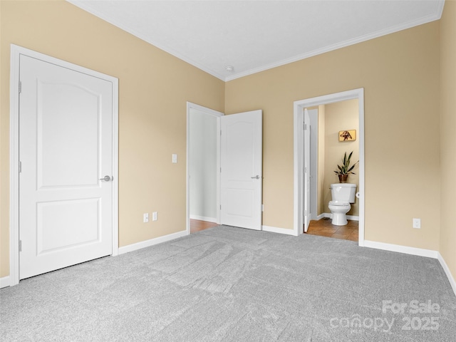 9 Farthings Dr, Arden, NC 28704 - unfurnished bedroom with ornamental molding, carpet, and ensuite bath