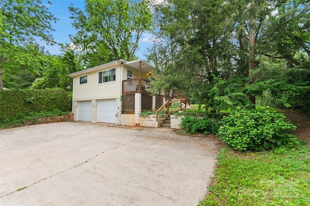 141 Elkwood Ave, Asheville, NC 28804 - view of front of house with an attached garage, stairway, and driveway