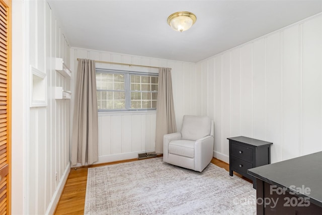 3969 Sheffield Dr, Charlotte, NC 28205 - living area featuring wood finished floors and baseboards