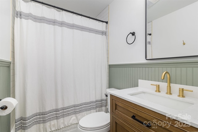 3969 Sheffield Dr, Charlotte, NC 28205 - full bath featuring wainscoting and vanity