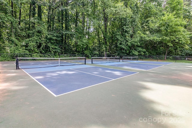 3969 Sheffield Dr, Charlotte, NC 28205 - view of tennis court with a forest view