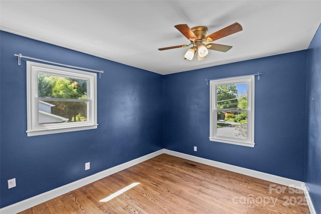 2000 Townsend Ave, Charlotte, NC 28205 - spare room with ceiling fan and wood finished floors