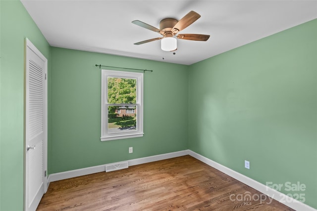 2000 Townsend Ave, Charlotte, NC 28205 - unfurnished room with wood finished floors and ceiling fan