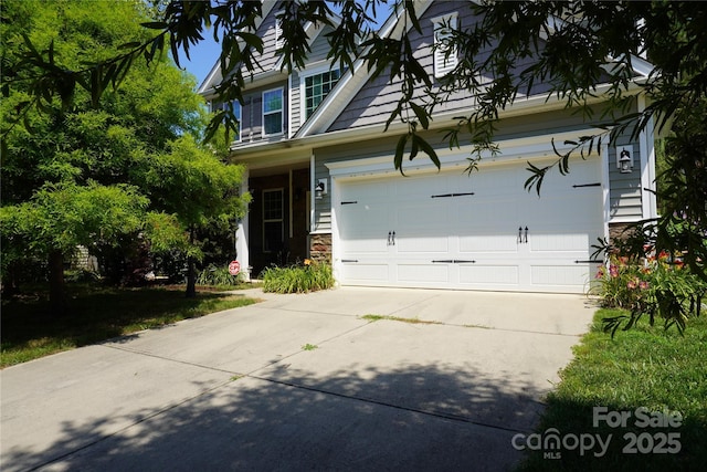 4003 Northerly Island Ct, Gastonia, NC 28056 - view of front facade with driveway, a garage, and stone siding