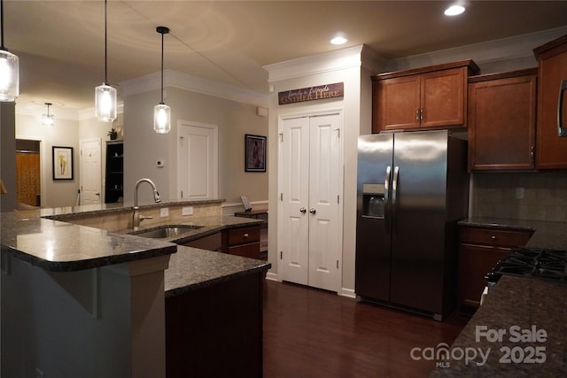 4003 Northerly Island Ct, Gastonia, NC 28056 - kitchen with stainless steel refrigerator with ice dispenser, decorative backsplash, ornamental molding, dark wood-type flooring, and recessed lighting