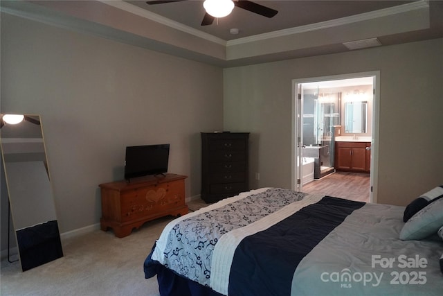 4003 Northerly Island Ct, Gastonia, NC 28056 - bedroom with ornamental molding, a ceiling fan, a raised ceiling, ensuite bathroom, and light colored carpet