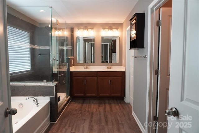 4003 Northerly Island Ct, Gastonia, NC 28056 - full bathroom with a bath, wood finished floors, double vanity, and a stall shower