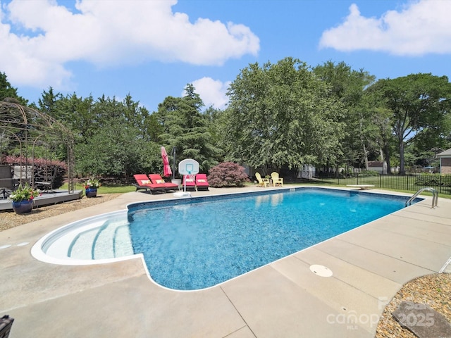 6523 Alba Rose Ln, Huntersville, NC 28078 - view of swimming pool featuring a patio area and view of wooded area
