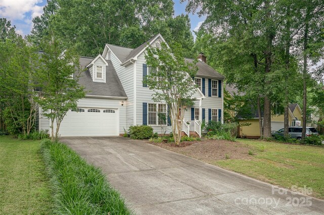13416 Kintyre Ct, Matthews, NC 28105 - view of front of home with a garage, asphalt driveway, a front yard, and a chimney