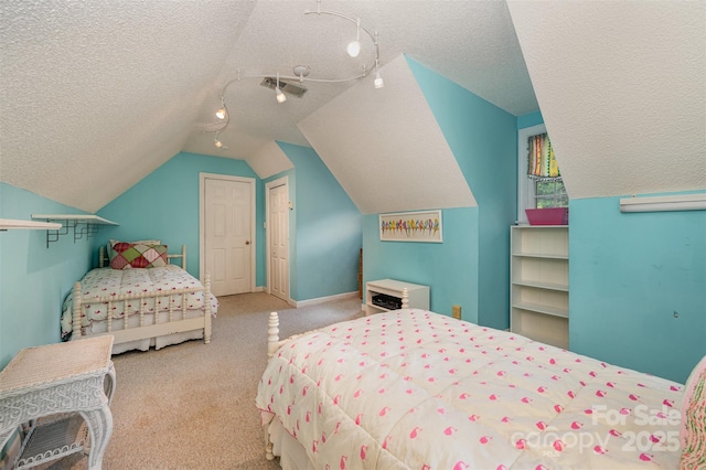 13416 Kintyre Ct, Matthews, NC 28105 - carpeted bedroom with a textured ceiling, lofted ceiling, and a closet