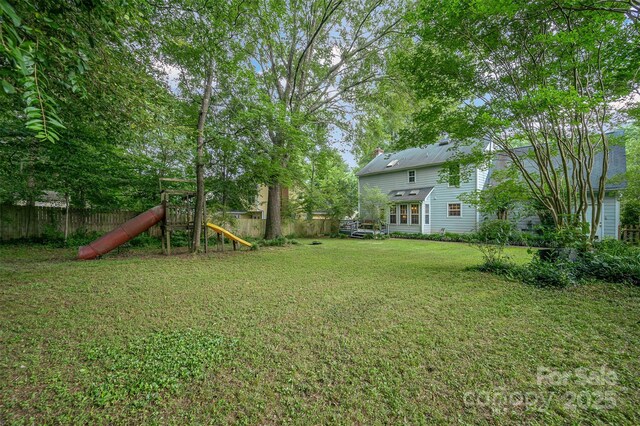 13416 Kintyre Ct, Matthews, NC 28105 - view of yard featuring a playground