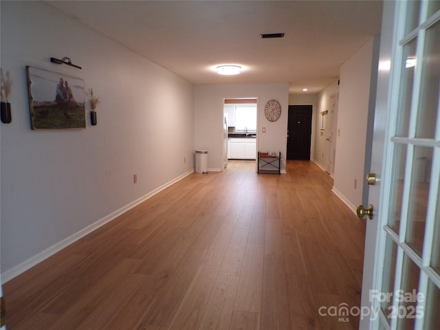 833 21st Ave NE Unit 833, Hickory, NC 28601 - empty room with wood finished floors and baseboards