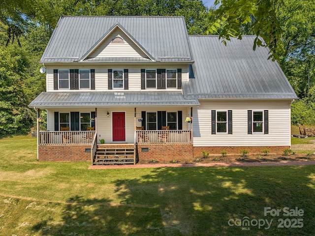 345 Bob Barnwell Rd, Fletcher, NC 28732 - view of front of house with a front lawn, covered porch, and a metal roof