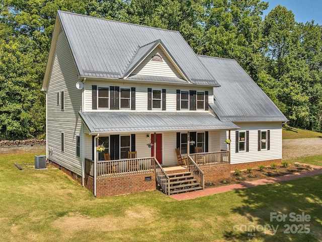 345 Bob Barnwell Rd, Fletcher, NC 28732 - view of front of house with a porch, a front yard, a metal roof, and crawl space