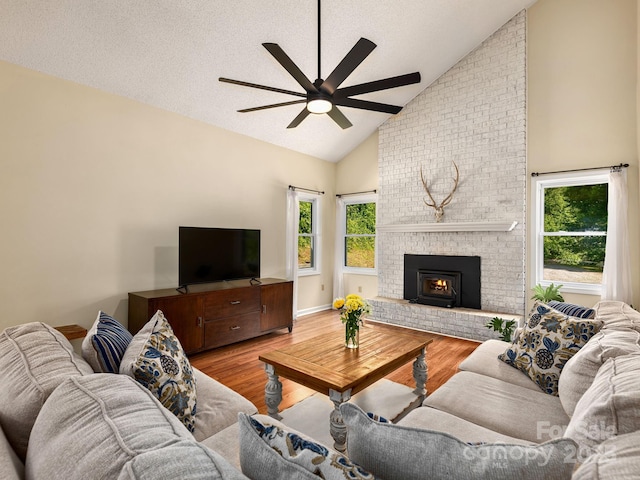 345 Bob Barnwell Rd, Fletcher, NC 28732 - living area featuring high vaulted ceiling, a ceiling fan, and wood finished floors